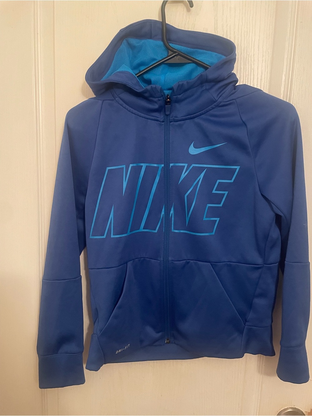 Kids zip up Nike sweater with hood size medium